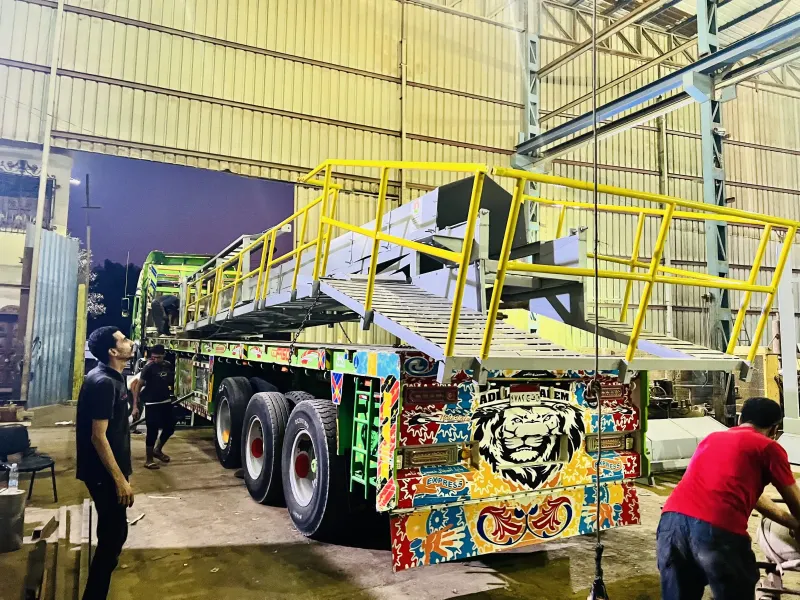 Loading equipment at the factory for delivery to site